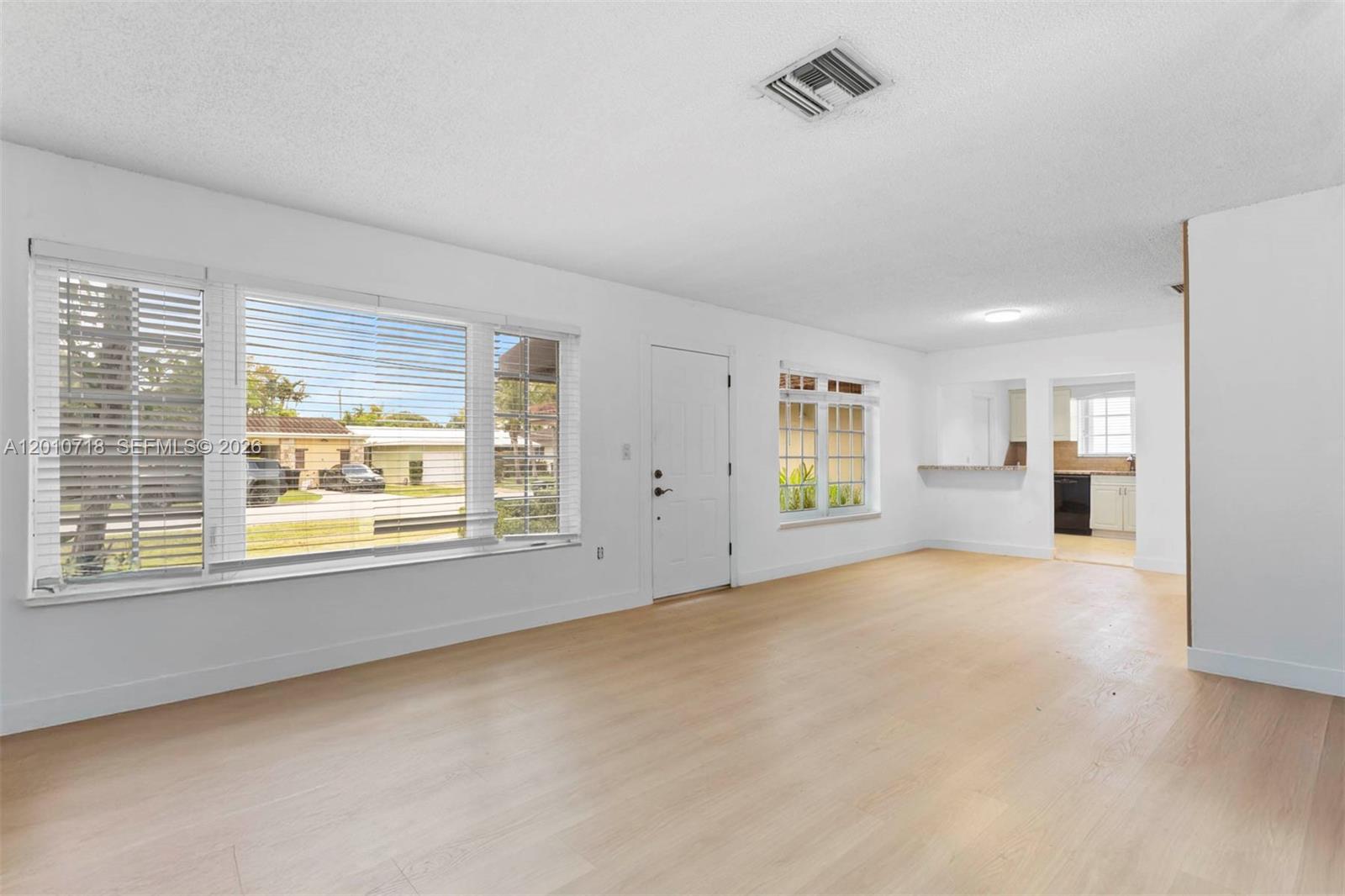 9125 Carlyle Avenue Surfside, FL 33154 - Photo 7 of 18 a view of an empty room with a window