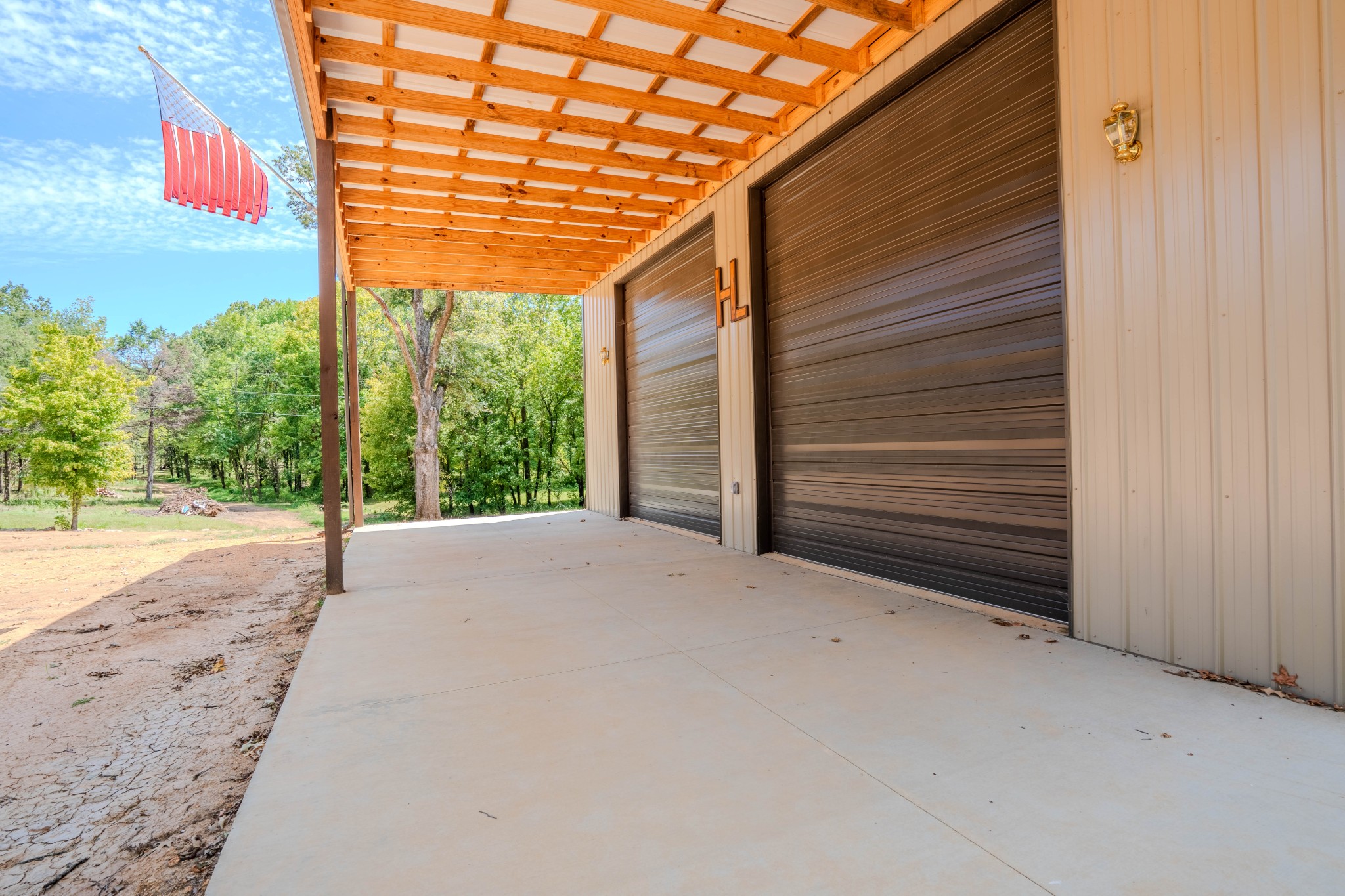 1 New Era Landing Road Linden, TN 37096 - Photo 11 of 55 a view of a porch with wooden stairs and a floor to ceiling window