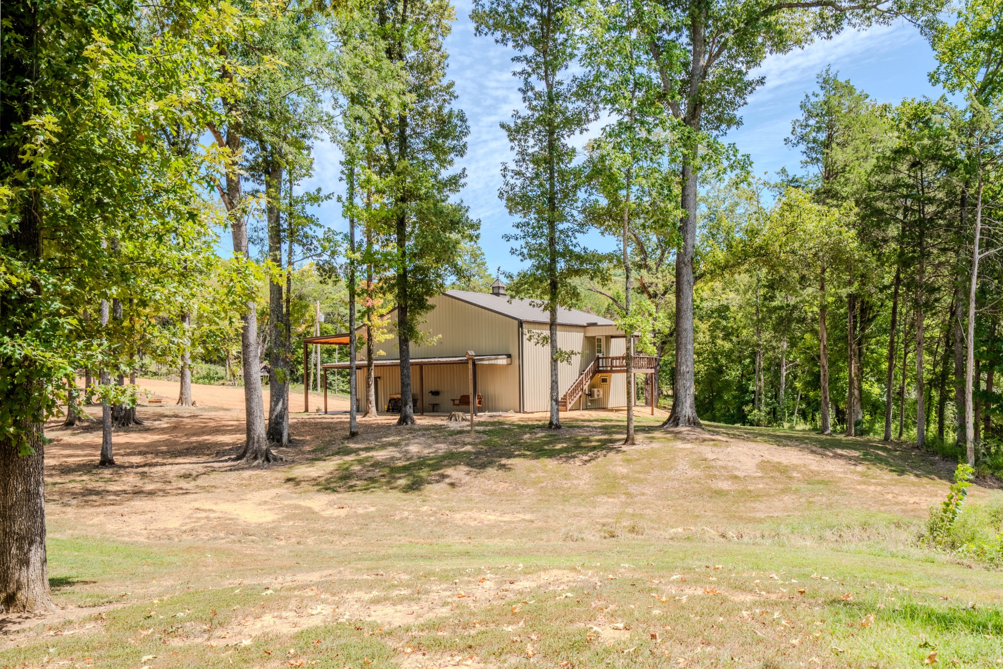 1 New Era Landing Road Linden, TN 37096 - Photo 13 of 55 a view of a yard with a tree