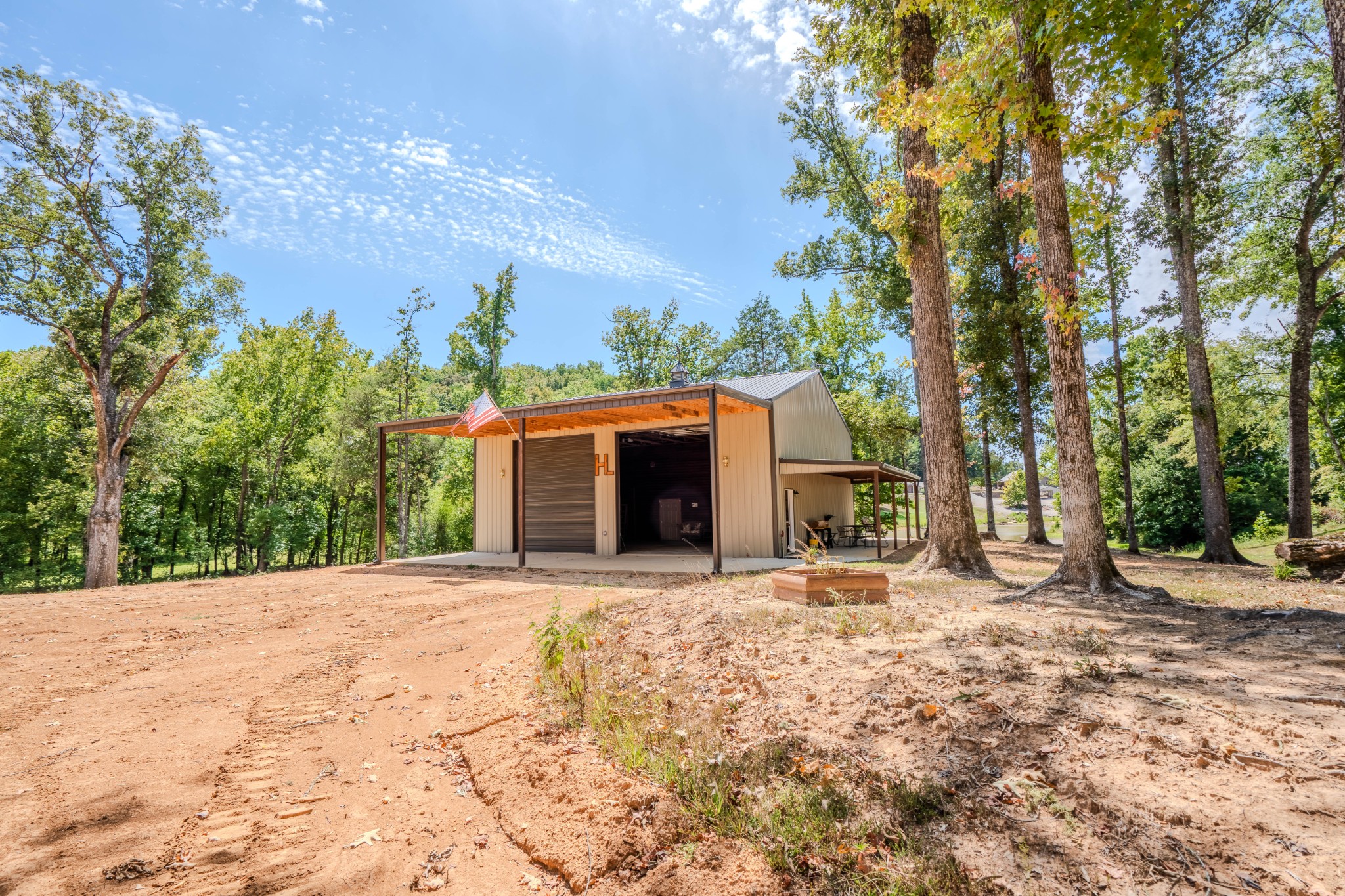 1 New Era Landing Road Linden, TN 37096 - Photo 14 of 55 a large house with a large tree in front of it