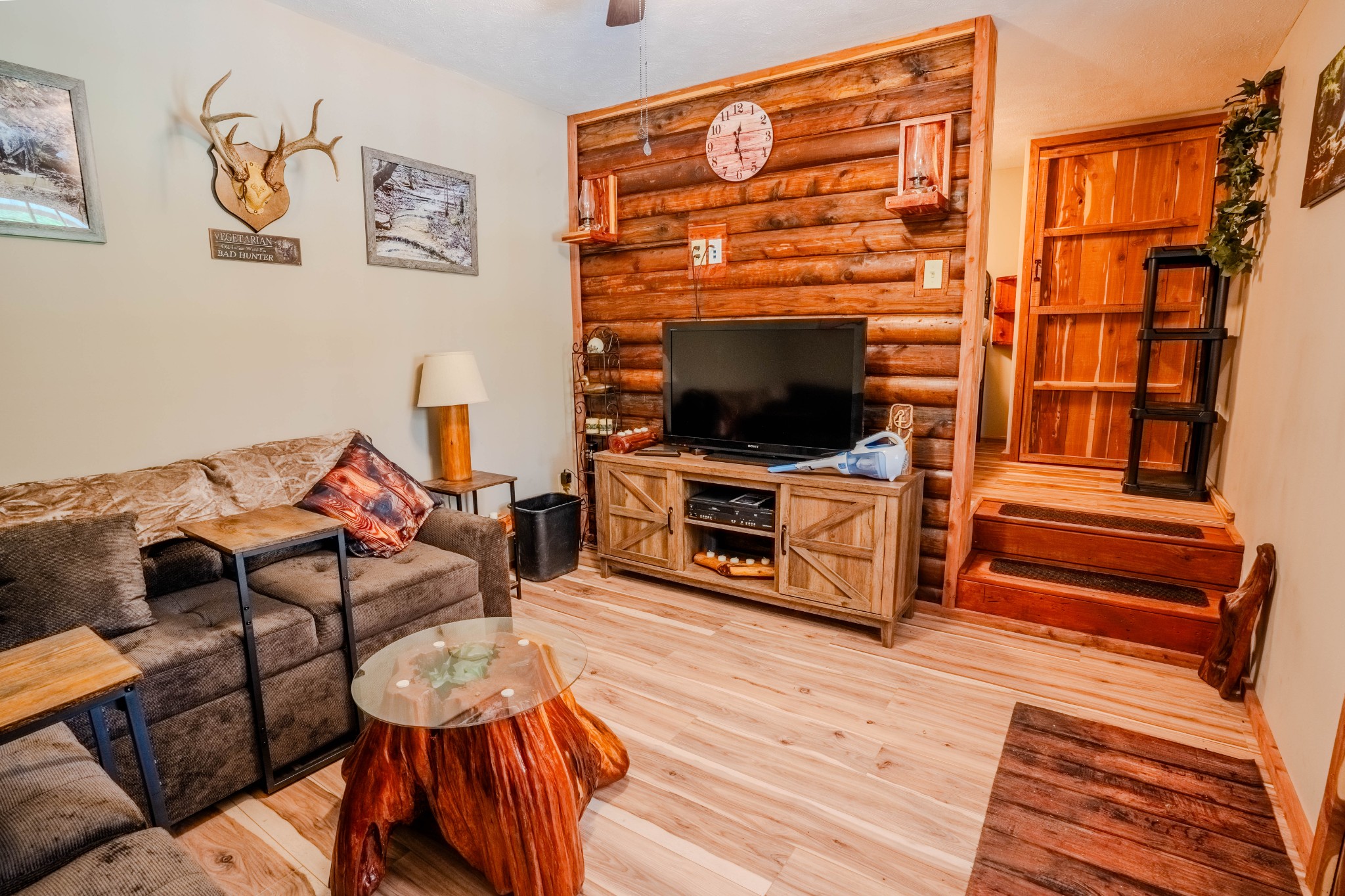 1 New Era Landing Road Linden, TN 37096 - Photo 19 of 55 a living room with furniture a flat screen tv and a fireplace