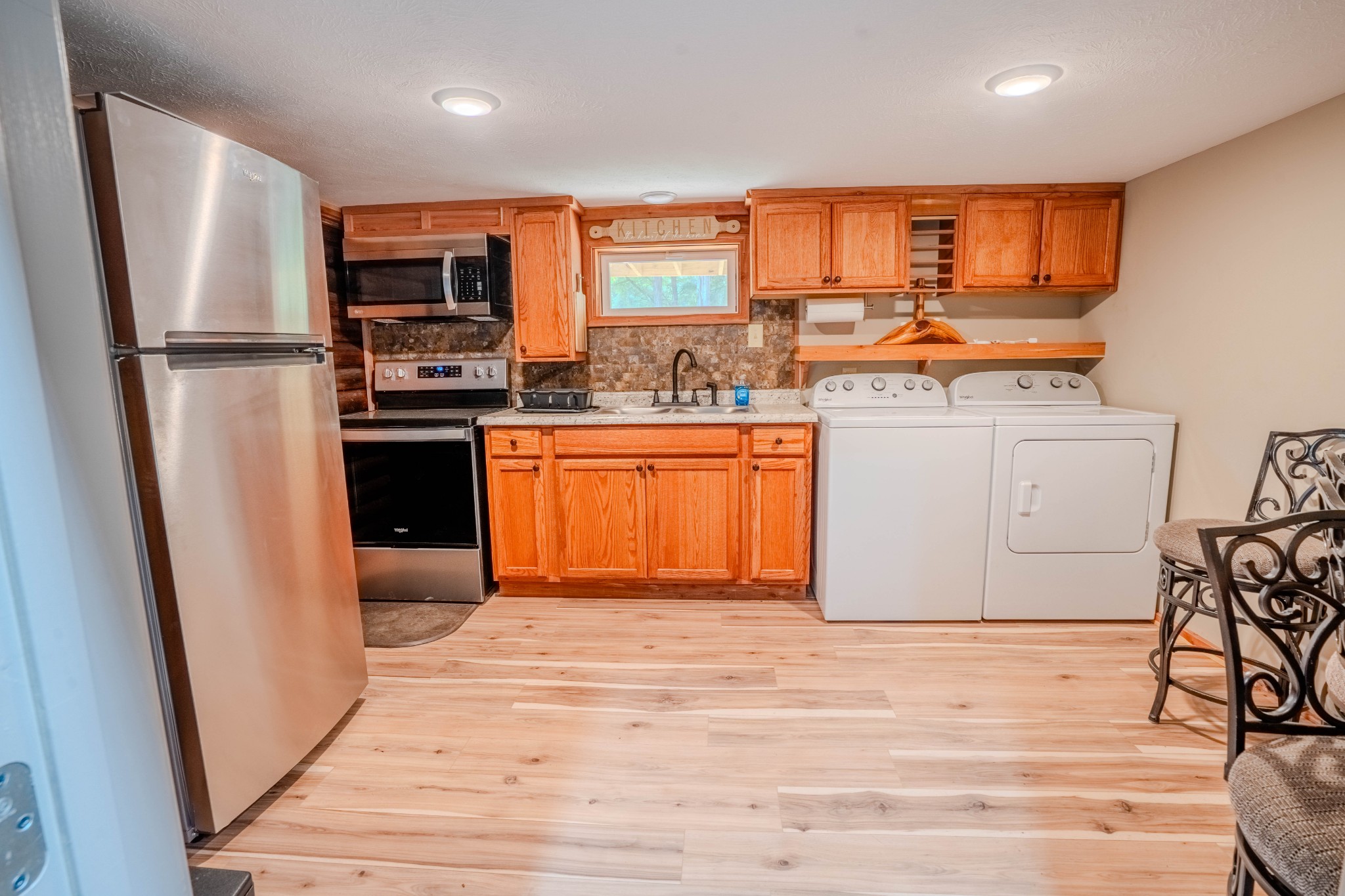 1 New Era Landing Road Linden, TN 37096 - Photo 22 of 55 a kitchen with stainless steel appliances granite countertop a refrigerator stove and oven