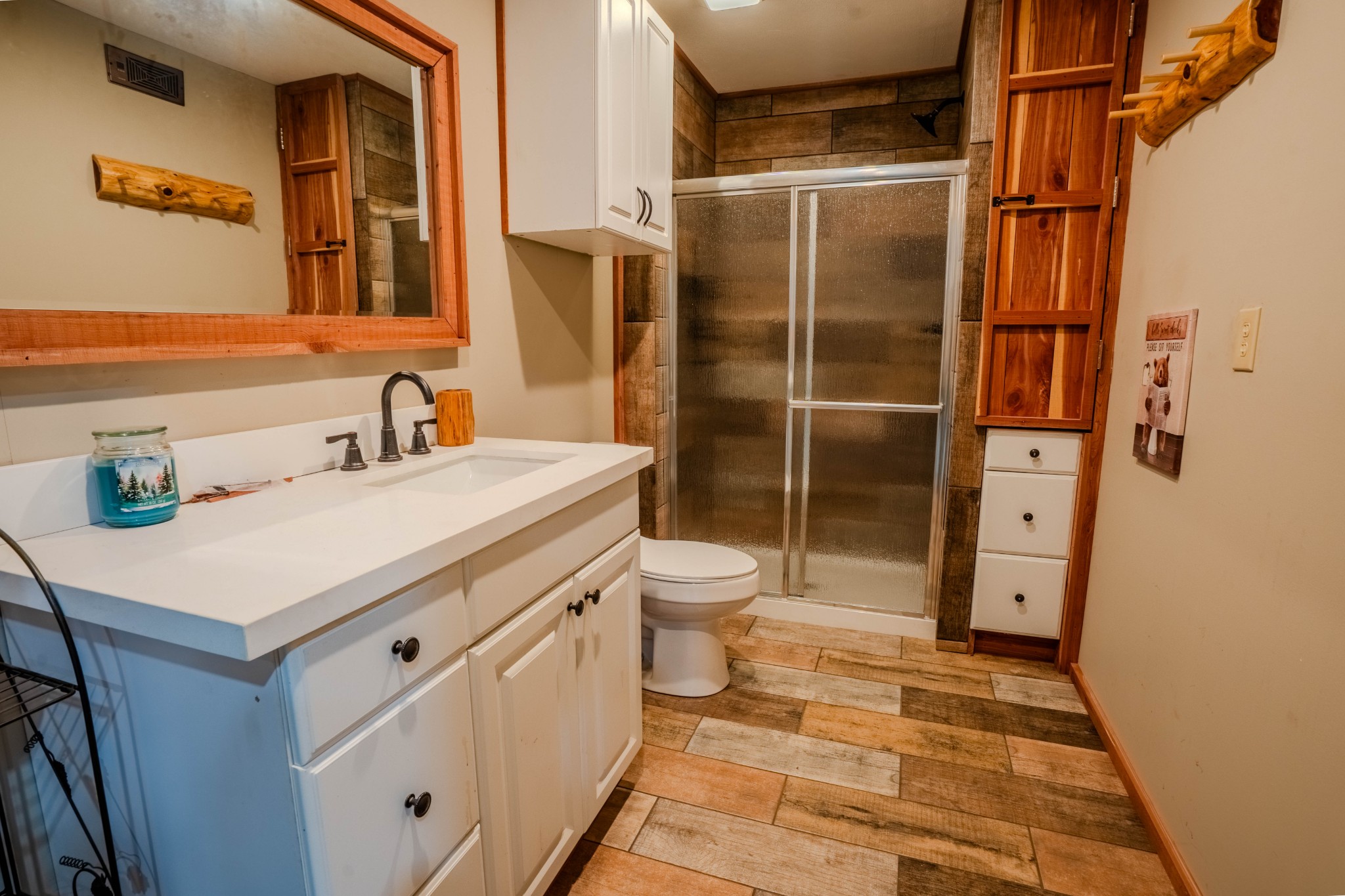 1 New Era Landing Road Linden, TN 37096 - Photo 24 of 55 a bathroom with a sink toilet and shower