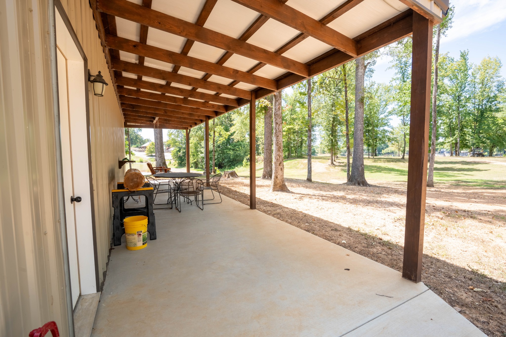 1 New Era Landing Road Linden, TN 37096 - Photo 32 of 55 a view of a porch with chairs and backyard