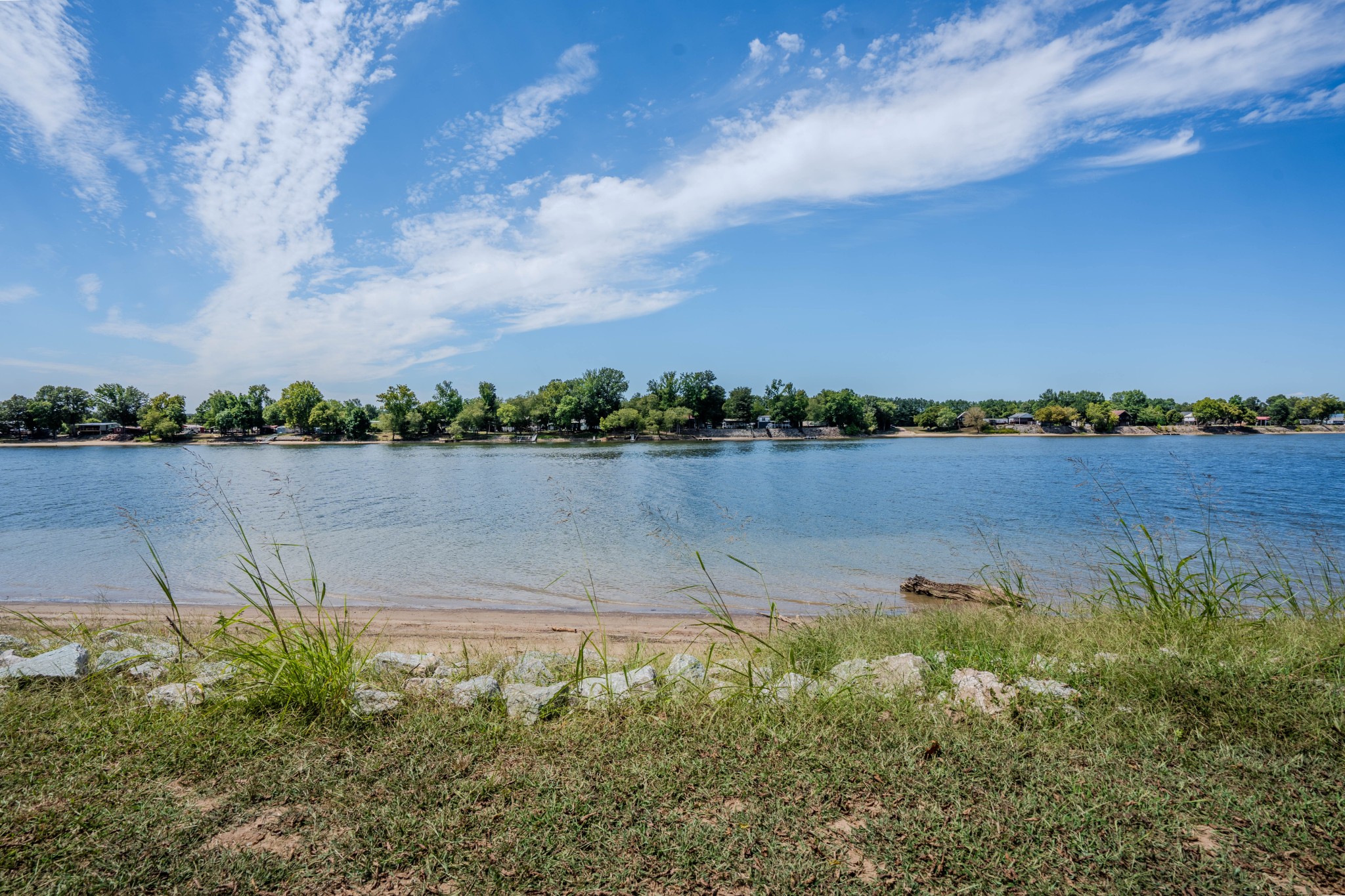1 New Era Landing Road Linden, TN 37096 - Photo 38 of 55 a view of a lake with houses in the back