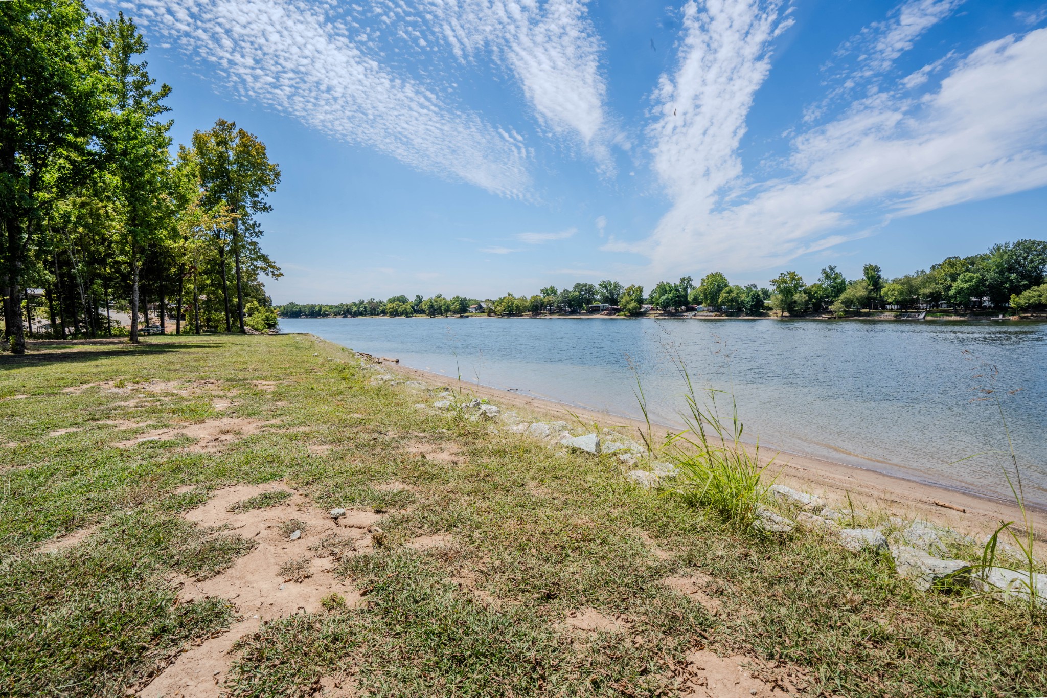1 New Era Landing Road Linden, TN 37096 - Photo 39 of 55 a view of a lake with houses in the back