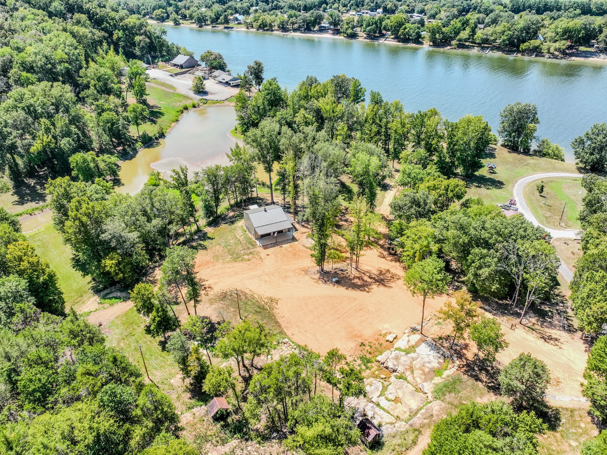 1 New Era Landing Road Linden, TN 37096 - Photo 55 of 55 an aerial view of a houses with a lake view