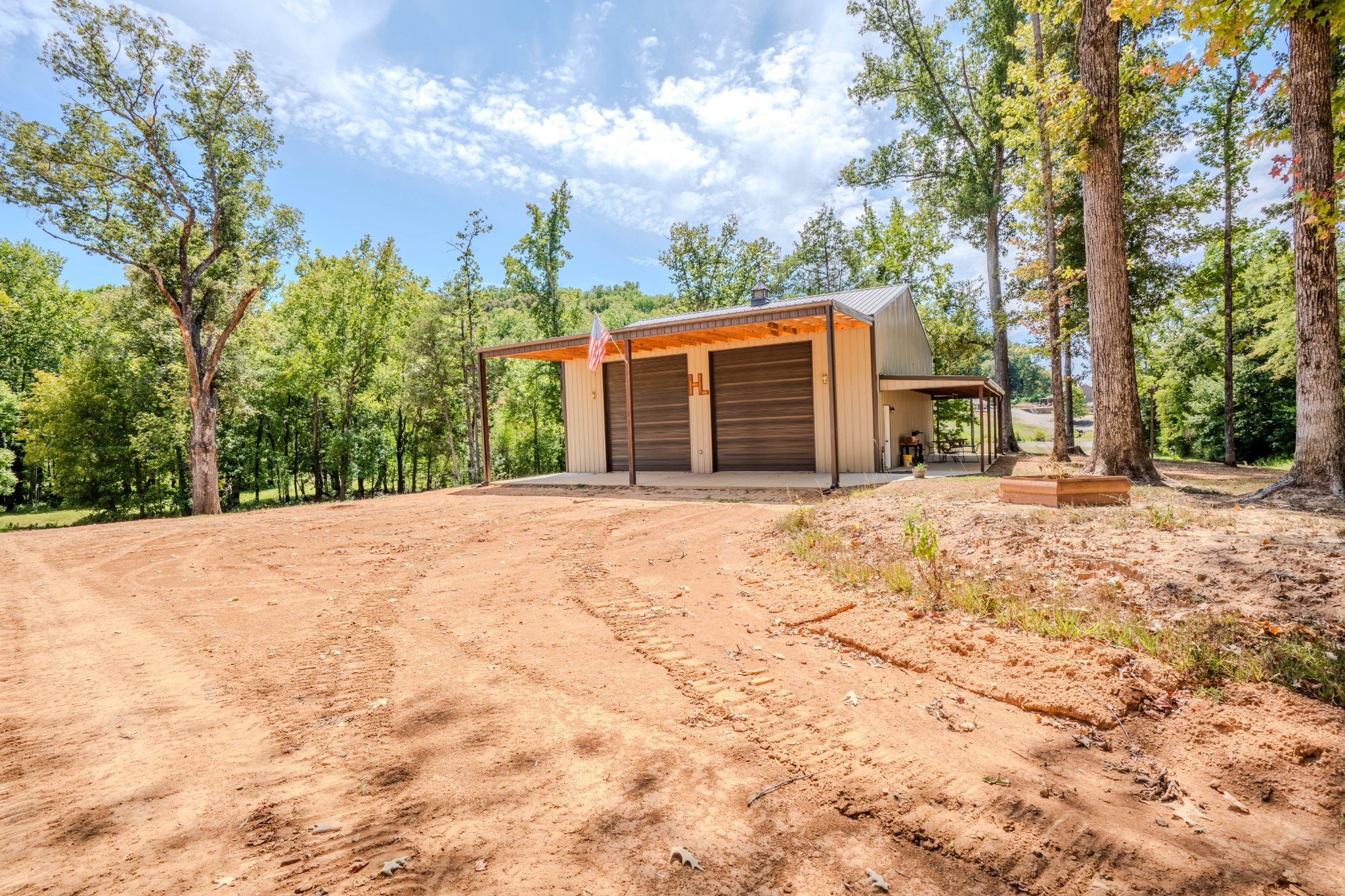 1 New Era Landing Road Linden, TN 37096 - Photo 9 of 55 a view of a house with a yard covered in snow