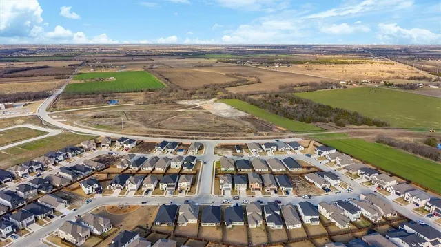 a view of an ocean with beach