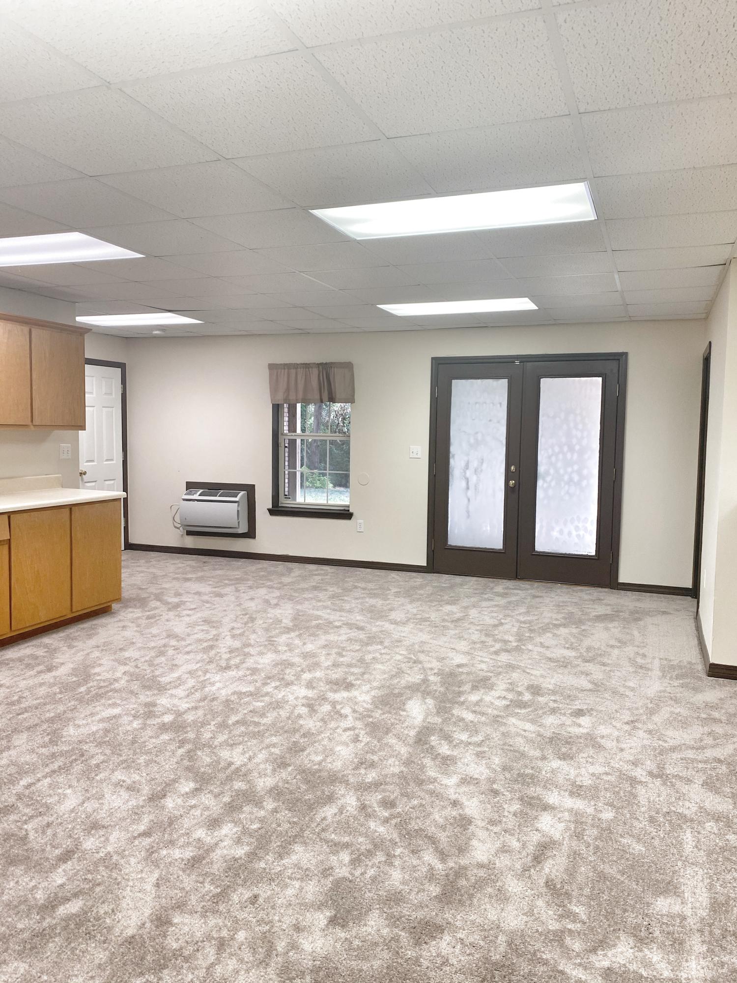 107 Blue Gill Way Crestview, FL 32539 - Photo 65 of 73 an empty room with a empty space and windows