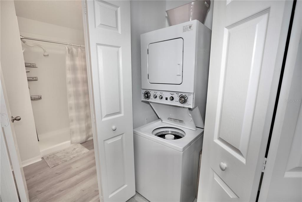 Undisclosed Address Sarasota, FL 34238 - Photo 16 of 56 a utility room with dryer and washer