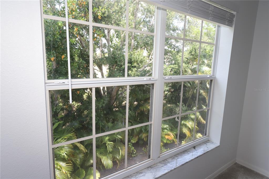Undisclosed Address Sarasota, FL 34238 - Photo 20 of 56 a view of a glass door with a balcony from a window