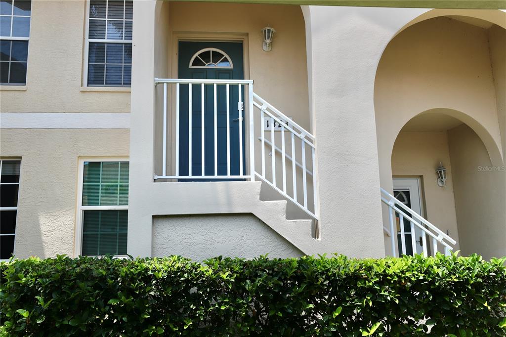 Undisclosed Address Sarasota, FL 34238 - Photo 2 of 56 front view of a house with a porch