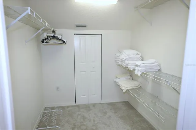 a view of balcony with furniture