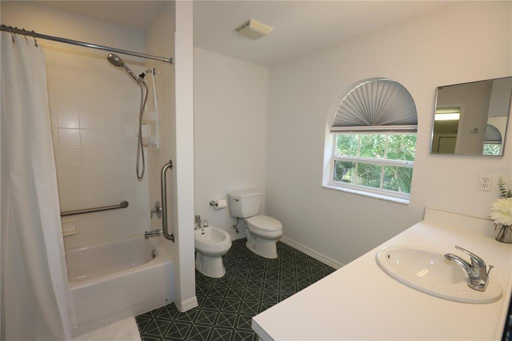 Undisclosed Address Sarasota, FL 34238 - Photo 22 of 56 a bathroom with a sink toilet and shower