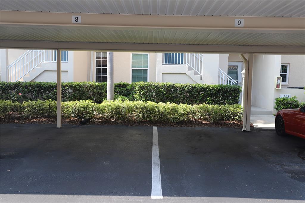 Undisclosed Address Sarasota, FL 34238 - Photo 25 of 56 a front view of a house with a yard