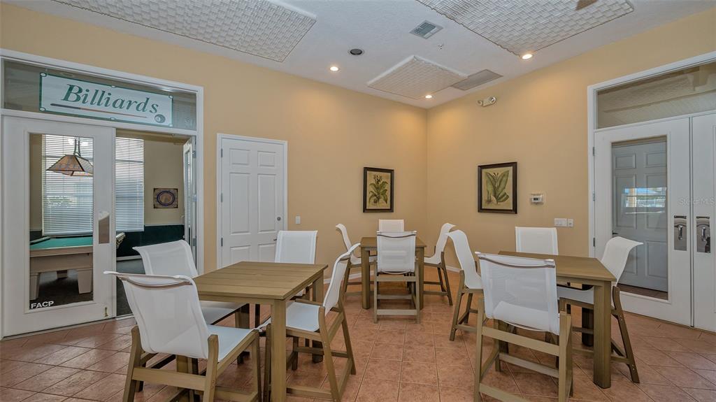 Undisclosed Address Sarasota, FL 34238 - Photo 30 of 56 a view of a dining room with furniture