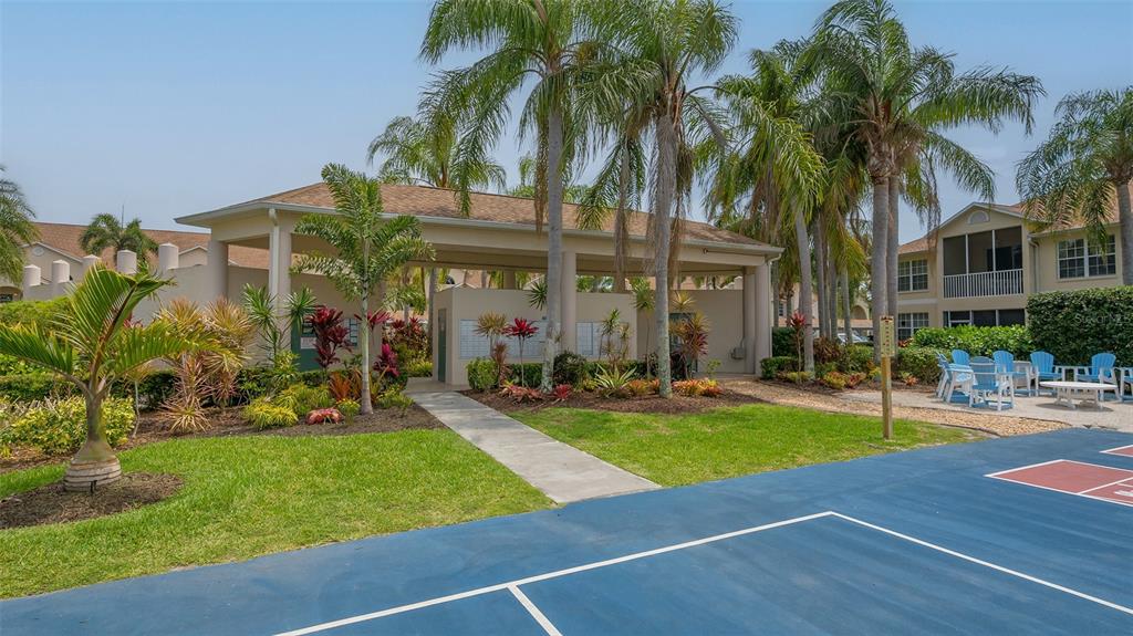 Undisclosed Address Sarasota, FL 34238 - Photo 48 of 56 a front view of house with yard and green space