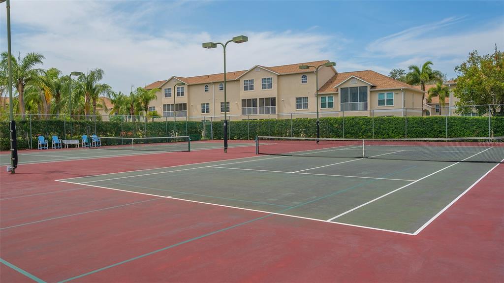 Undisclosed Address Sarasota, FL 34238 - Photo 52 of 56 a view of a tennis court