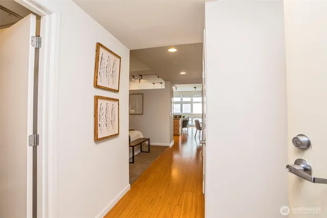 a picture of a room with windows and closet