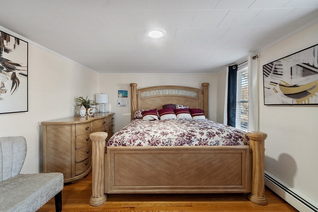 2 Grove Street Methuen, MA 01844 - Photo 16 of 38 a bedroom with a bed and furniture