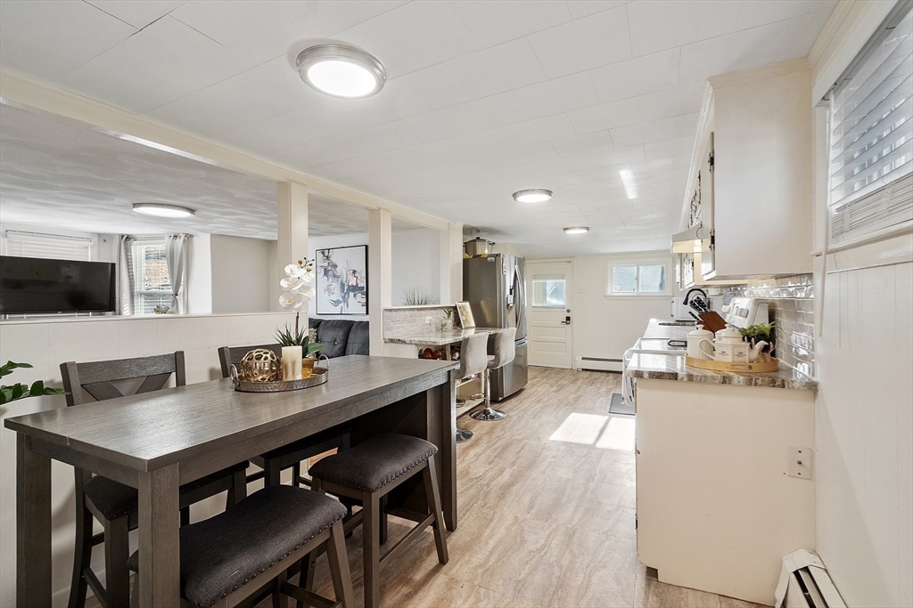 2 Grove Street Methuen, MA 01844 - Photo 9 of 38 a very nice looking dining room with a table and chairs