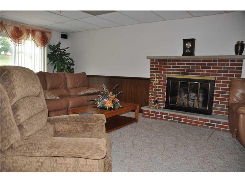 210 Edgewood Road Beaver Falls, PA 15010 - Photo 4 of 25 Exterior Front. This is a great family room for soooo many reasons .. a propane fireplace to keep you warm and snuggly .. large enough to entertain with easy access to wet bar and rear patio and your table top lot through sliding glass doors