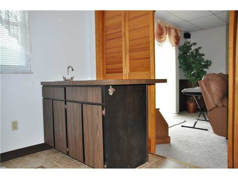 210 Edgewood Road Beaver Falls, PA 15010 - Photo 7 of 25 Exterior Front. wet bar for entertain in your family room with the added benefit of being tucked away when not in use