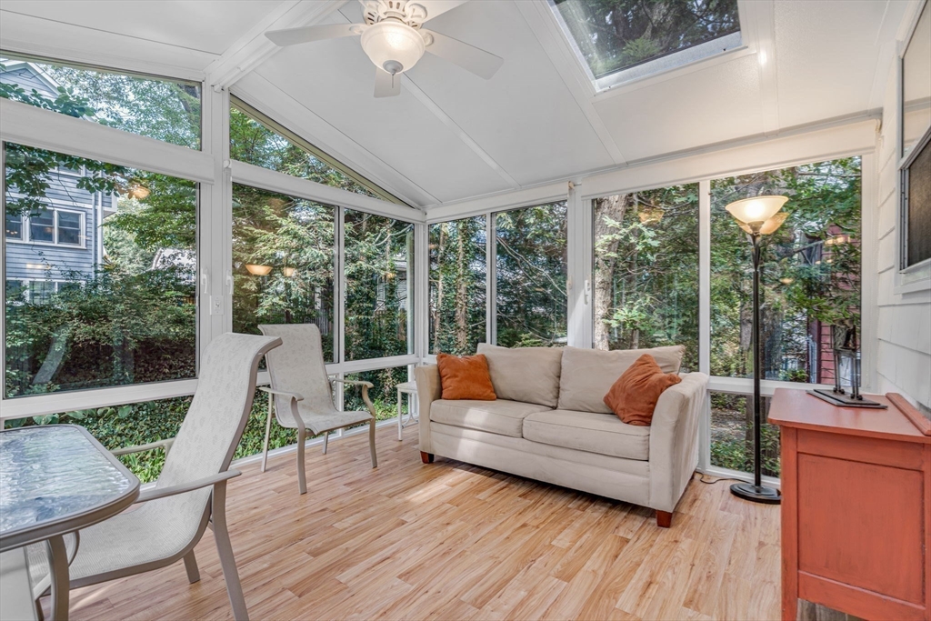 10 Stevens Terrace Arlington, MA 02476 - Photo 14 of 31 a living room with furniture and a large window