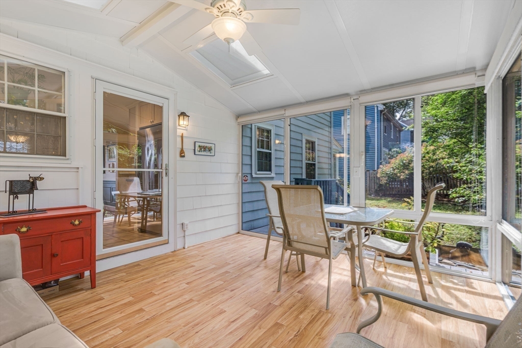 10 Stevens Terrace Arlington, MA 02476 - Photo 15 of 31 a view of a dining room with furniture window and outside view