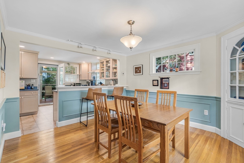 10 Stevens Terrace Arlington, MA 02476 - Photo 16 of 31 a view of a dining room with furniture and wooden floor