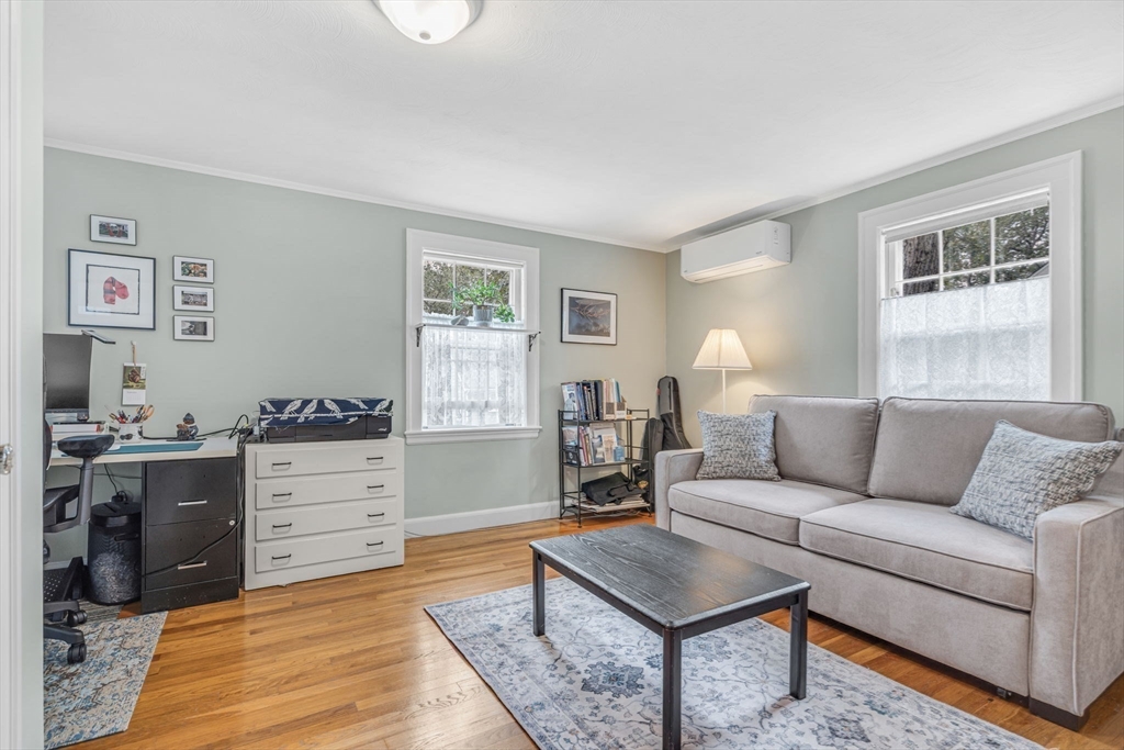 10 Stevens Terrace Arlington, MA 02476 - Photo 23 of 31 a living room with furniture and a window