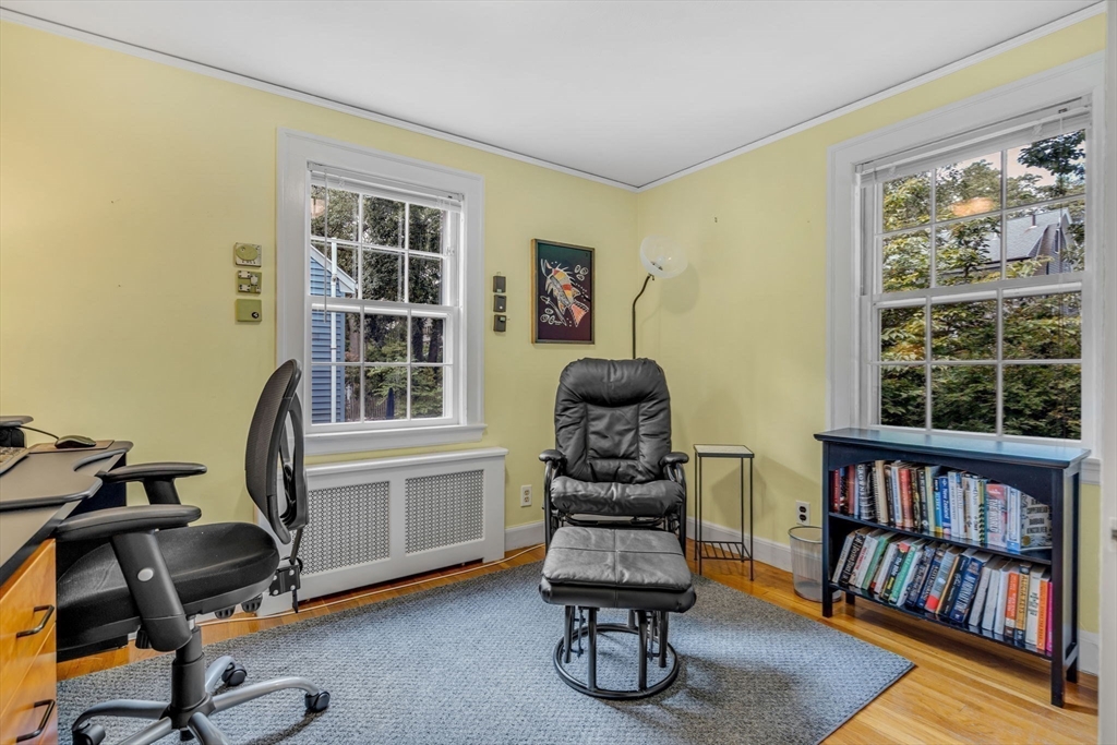 10 Stevens Terrace Arlington, MA 02476 - Photo 25 of 31 a workspace with furniture bookshelf and a window