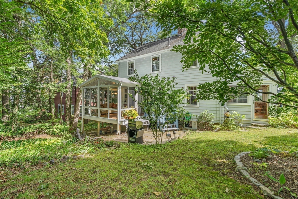 10 Stevens Terrace Arlington, MA 02476 - Photo 29 of 31 a view of a house with a backyard