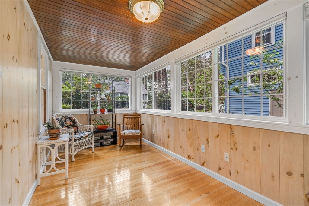 10 Stevens Terrace Arlington, MA 02476 - Photo 5 of 31 a living room with large windows