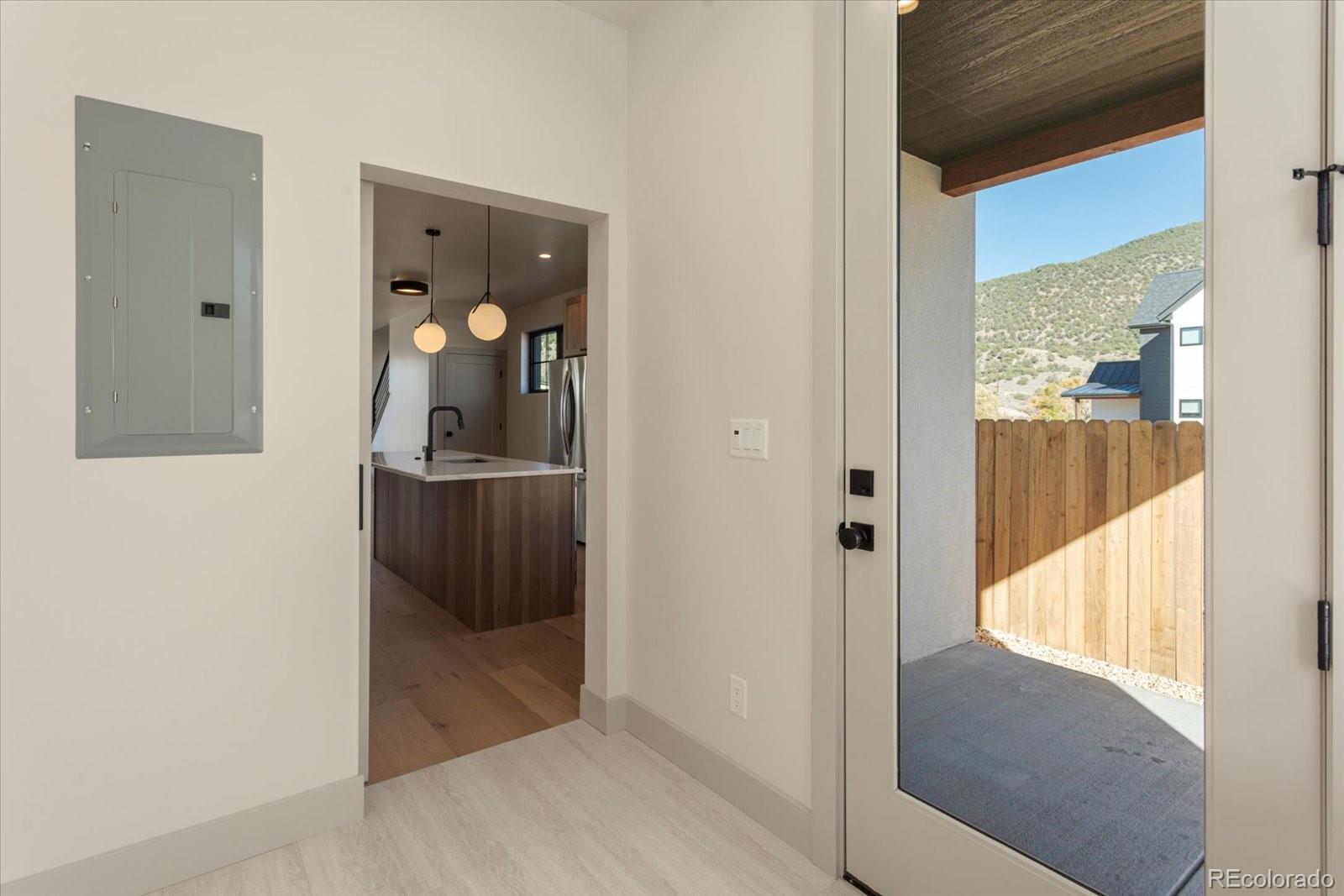 125 Confluence Road Salida, CO 81201 - Photo 25 of 48 a view of a hallway with wooden floor and entryway