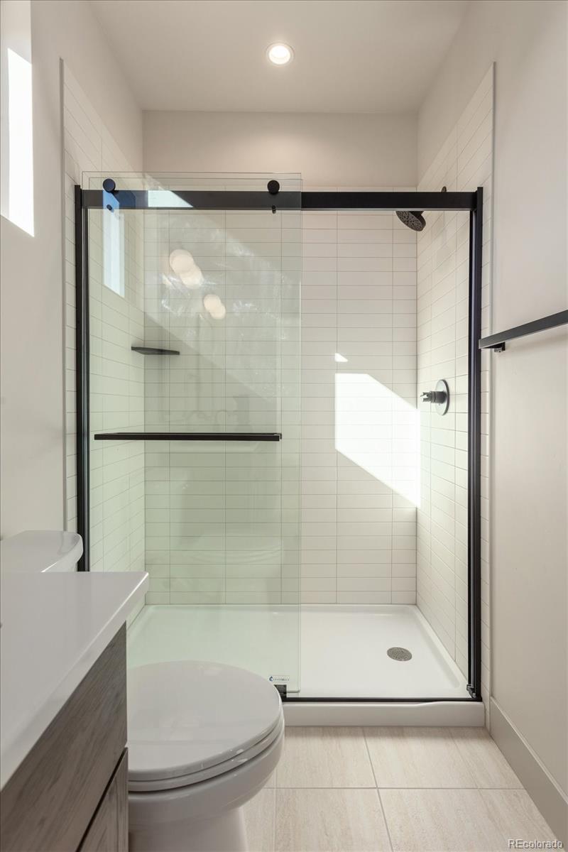 125 Confluence Road Salida, CO 81201 - Photo 29 of 48 a bathroom with a shower and a toilet