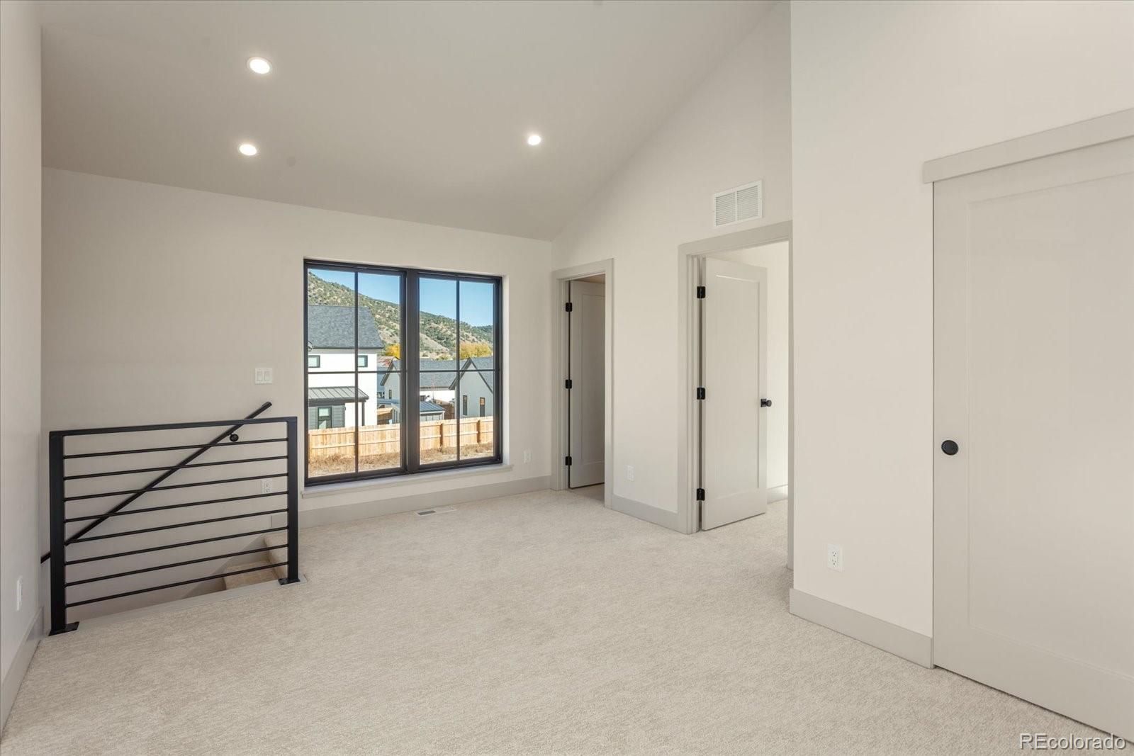 125 Confluence Road Salida, CO 81201 - Photo 34 of 48 an empty room with windows