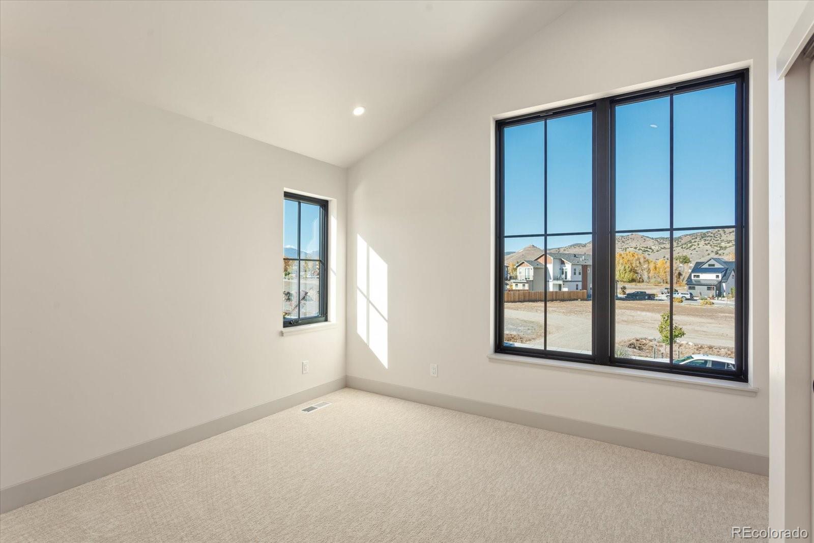 125 Confluence Road Salida, CO 81201 - Photo 35 of 48 an empty room with windows and closet