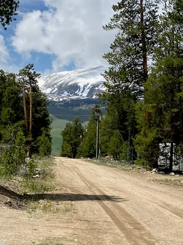 a view of a backyard of the house