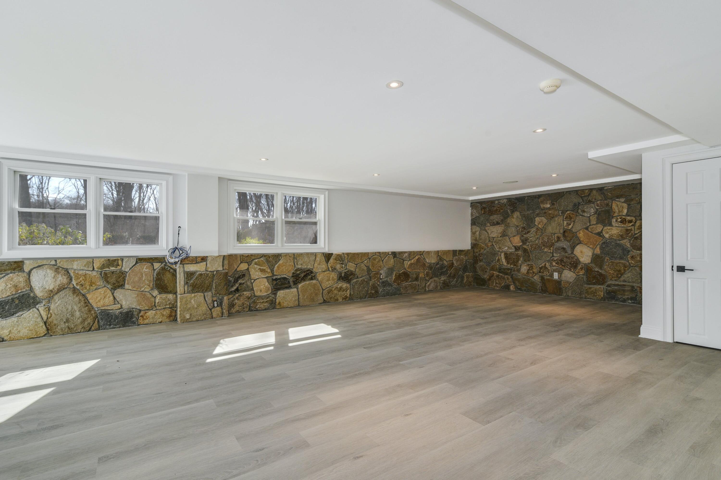 507 Trinity Pass Road New Canaan, CT 06840 - Photo 14 of 23 a view of livingroom with furniture and wooden floor