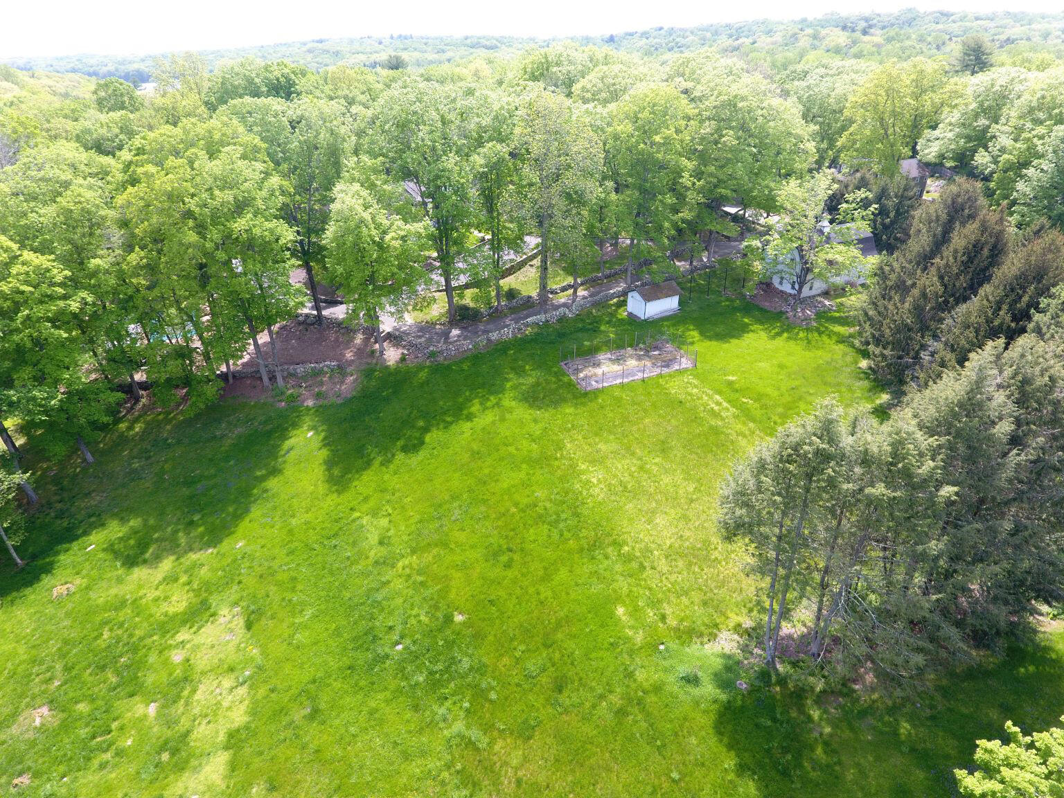 507 Trinity Pass Road New Canaan, CT 06840 - Photo 23 of 23 a view of an outdoor space and a yard