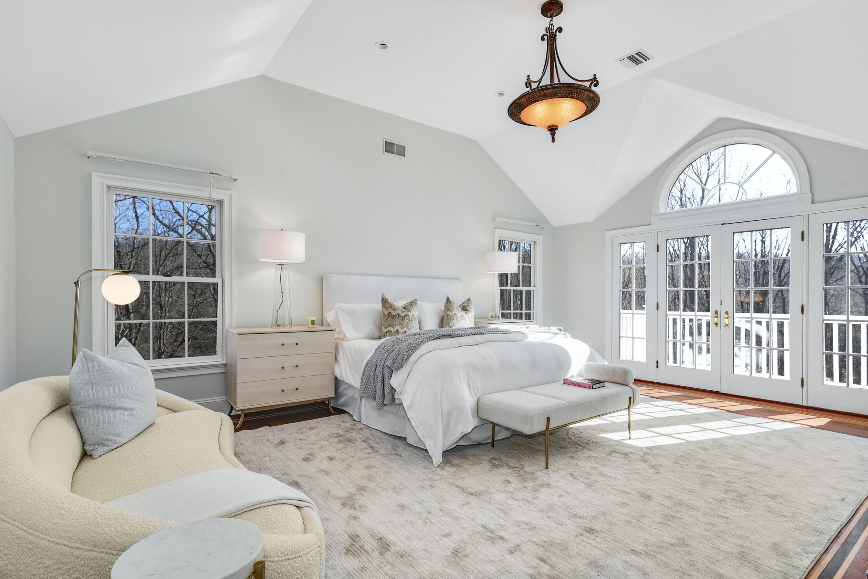 507 Trinity Pass Road New Canaan, CT 06840 - Photo 10 of 23 a bedroom with bed and a window