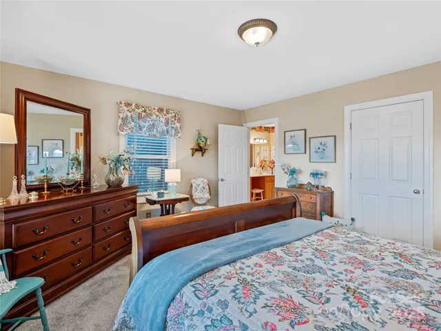 a bathroom with a sink vanity and a mirror