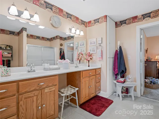 a view of living room filled with furniture and a window