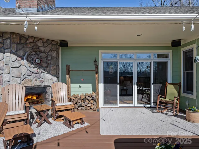 a view of balcony with couch and wooden floor