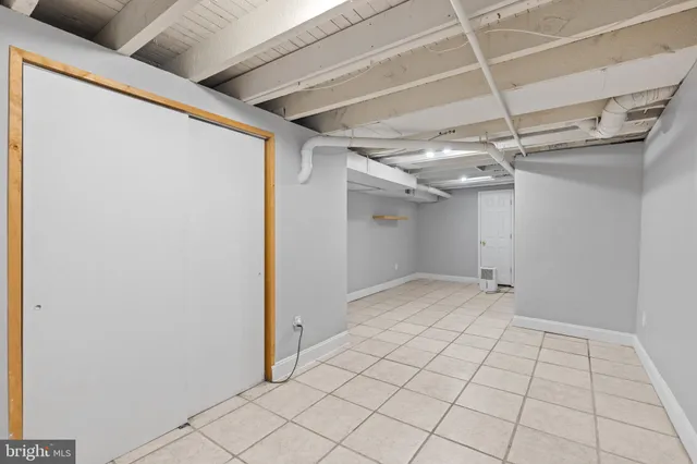 a bathroom with a shower toilet and sink