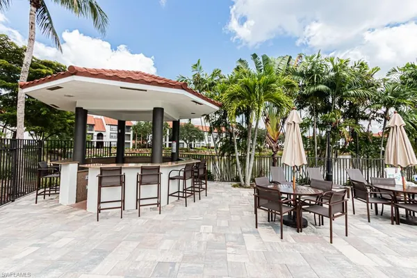 a view of a patio with swimming pool