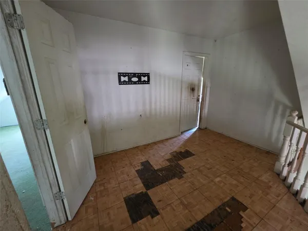 a bathroom with a shower and a toilet