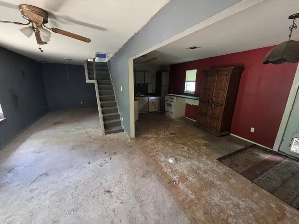 a view of a livingroom with a staircase